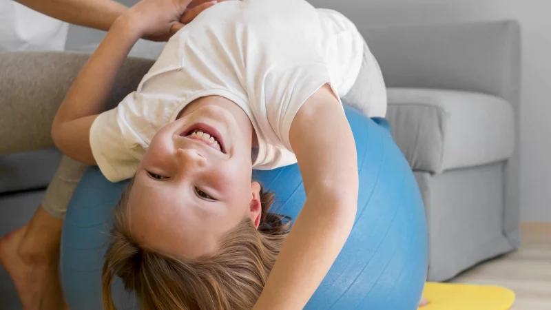 mom-help-girl-train-ball-ezgif.com-optiwebp